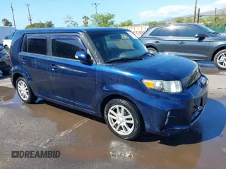 2014 Scion xB with VIN JTLZE4FE6EJ057604, listed as a IAAI auction lot 41528031 with 48,403 mi miles. Bid and sale history available at carsss.com. Image 1.