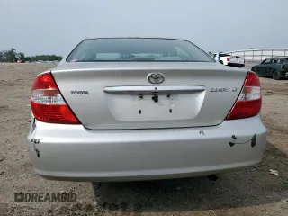 2004 Toyota Camry LE z VIN 4T1BE32K14U844858, wystawiony jako Copart lot #57564715 z przebiegiem 242 775 mil mil oraz Czysty tytuł • Clean title. Historia ofert i sprzedaży dostępna na DreamBid. Obrazek 6.