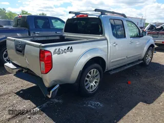 2011 Nissan Frontier Pro-4X with VIN 1N6AD0EV0BC408218, listed as a IAAI auction lot 42187823 with 165,995 mi miles and . Bid and sale history available at DreamBid. Image 4.