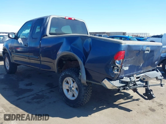 2003 Ford F-150 XL with VIN 1FTRX18WX3NA22323, listed as a IAAI auction lot 41635869 with 129,029 mi miles. Bid and sale history available at carsss.com. Image 3.