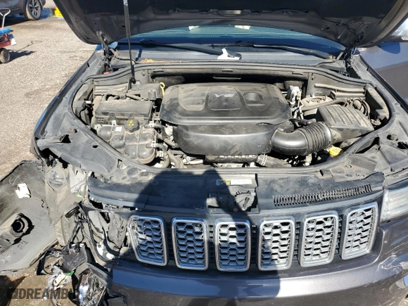 2017 Jeep Grand Cherokee Overland with VIN 1C4RJECGXHC696676, listed as a Copart auction lot 86885924 with 154,754 mi miles and Salvage Title. Bid and sale history available at carsss.com. Image 12.