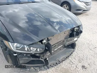 2018 Jaguar XE with VIN SAJAF4GX0JCP40050, listed as a IAAI auction lot 41245040 with 93,489 mi miles and . Bid and sale history available at DreamBid. Image 6.