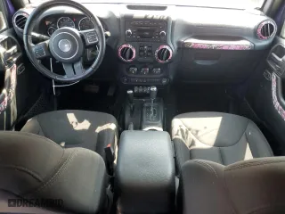2018 Jeep Wrangler JK Unlimited Sport S with VIN 1C4BJWDGXJL911081, listed as a Copart auction lot 69205464 with 117,576 mi miles and Salvage Title. Bid and sale history available at carsss.com. Image 8.