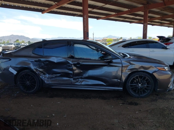 2021 Toyota Camry XSE z VIN 4T1K61AK7MU518176, wystawiony jako IAAI lot #42121890 z przebiegiem 70 634 mil mil oraz . Historia ofert i sprzedaży dostępna na DreamBid. Obrazek 14.