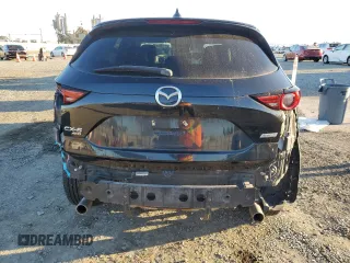 2018 Mazda CX-5 Grand Touring with VIN JM3KFBDMXJ0318474, listed as a Copart auction lot 46438545 with 58,702 mi miles and Salvage Title. Bid and sale history available at DreamBid. Image 6.