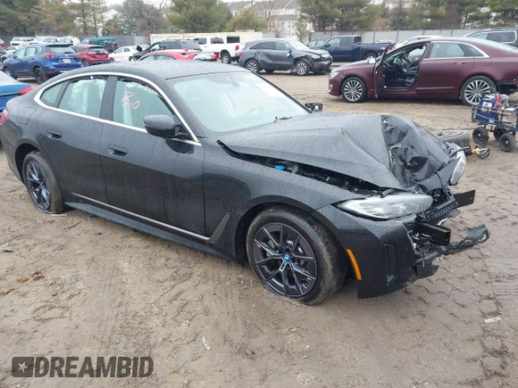 2023 BMW i4 eDrive35 z VIN WBY43AW03PFP82824, wystawiony jako IAAI lot #41468805 z przebiegiem 9 mil mil oraz . Historia ofert i sprzedaży dostępna na DreamBid. Obrazek 1.