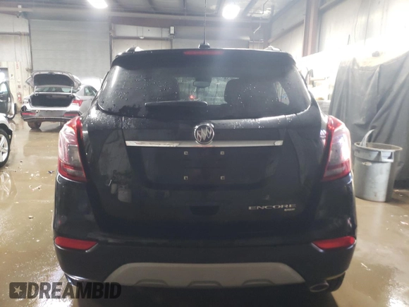 2020 Buick Encore Essence z VIN KL4CJGSB6LB045867, wystawiony jako Copart lot #88046955 z przebiegiem 37 595 mil mil oraz Szkody całkowita. Historia ofert i sprzedaży dostępna na DreamBid. Obrazek 6.