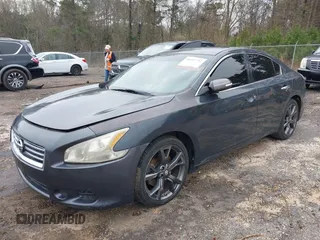 2013 Nissan Maxima SV with VIN 1N4AA5AP1DC844312, listed as a IAAI auction lot 41447722 with 135,873 mi miles and . Bid and sale history available at DreamBid. Image 2.