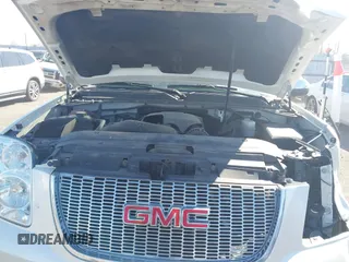 2014 GMC Yukon SLT with VIN 1GKS1CE01ER179379, listed as a IAAI auction lot 41717271 with 136,999 mi miles. Bid and sale history available at carsss.com. Image 10.
