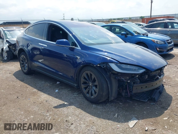 2018 Tesla Model X 75D with VIN 5YJXCAE21JF132628, listed as a IAAI auction lot 42081282 with 35,360 mi miles and . Bid and sale history available at carsss.com. Image 1.