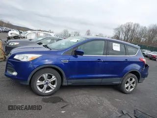 2015 Ford Escape SE with VIN 1FMCU9GX4FUC73125, listed as a IAAI auction lot 42071815 with 71,681 mi miles. Bid and sale history available at carsss.com. Image 14.
