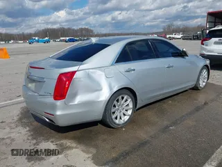2015 Cadillac CTS RWD with VIN 1G6AP5SX5F0115745, listed as a IAAI auction lot 41658935 with 62,477 mi miles and . Bid and sale history available at DreamBid. Image 4.