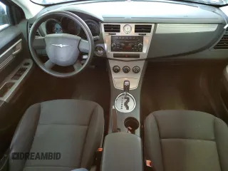 2010 Chrysler Sebring Touring with VIN 1C3CC4FBXAN220016, listed as a Copart auction lot 70784864 with 173,337 mi miles and Salvage Title. Bid and sale history available at carsss.com. Image 8.
