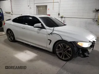 2015 BMW 4 Series 435i with VIN WBA3R1C53FK194890, listed as a Copart auction lot 87603825 with 126,991 mi miles and Salvage Title. Bid and sale history available at DreamBid. Image 4.