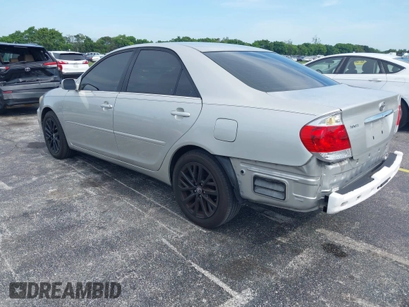 2005 Toyota Camry LE with VIN 4T1BE30K35U572110, listed as a IAAI auction lot 42674324 with 147,480 mi miles and . Bid and sale history available at DreamBid. Image 3.
