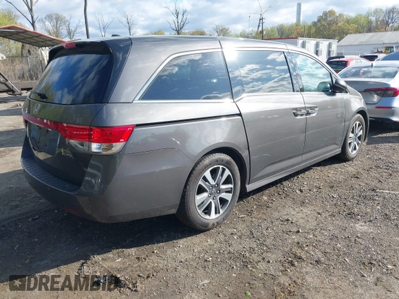 2015 Honda Odyssey Touring Elite with VIN 5FNRL5H99FB094727, listed as a IAAI auction lot 42001288 with 254,015 mi miles and . Bid and sale history available at DreamBid. Image 4.