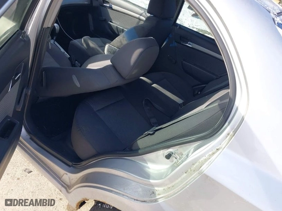 2009 Chevrolet Aveo LT w/1LT with VIN KL1TD56E59B367549, listed as a IAAI auction lot 41297308 with 104,562 mi miles. Bid and sale history available at carsss.com. Image 8.