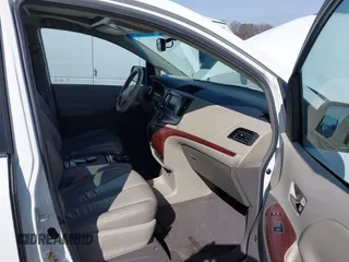 2011 Toyota Sienna XLE AAS with VIN 5TDYK3DCXBS043733, listed as a IAAI auction lot 41601544 with 221,658 mi miles and . Bid and sale history available at DreamBid. Image 5.