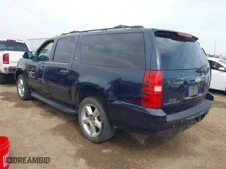 2009 Chevrolet Suburban LT w/2LT with VIN 1GNFC26JX9R280829, listed as a IAAI auction lot 41551580 with 214,351 mi miles. Bid and sale history available at carsss.com. Image 3.
