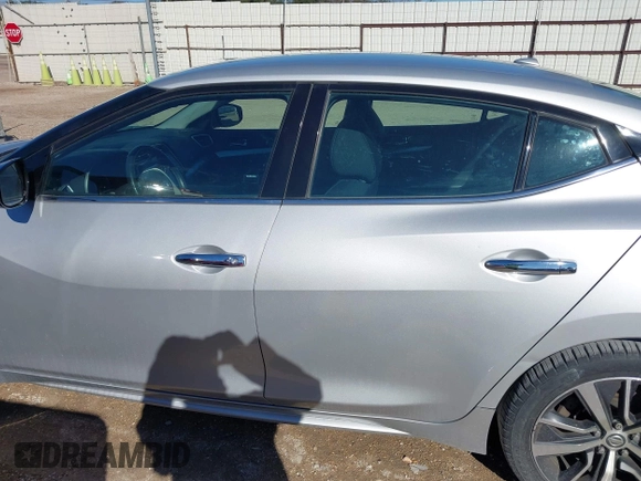 2019 Nissan Maxima SV with VIN 1N4AA6AV0KC371696, listed as a IAAI auction lot 41240863 with 143,348 mi miles and . Bid and sale history available at DreamBid. Image 15.