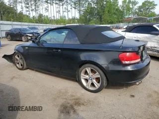 2010 BMW 1 Series 128i with VIN WBAUL7C54AVJ77774, listed as a Copart auction lot 50040934 with 144,757 mi miles and Salvage Title. Bid and sale history available at carsss.com. Image 2.