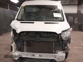2016 Ford Transit Cargo with VIN 1FTYE1CM0GKA13242, listed as a IAAI auction lot 41655642 with 107,589 mi miles and . Bid and sale history available at carsss.com. Image 6.