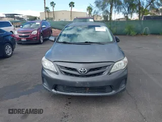 2011 Toyota Corolla L with VIN 2T1BU4EE9BC548192, listed as a IAAI auction lot 42036004 with 111,131 mi miles. Bid and sale history available at carsss.com. Image 12.