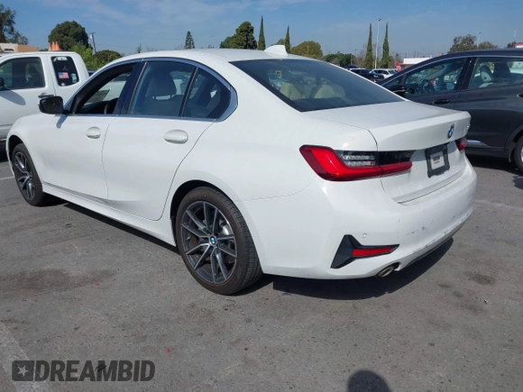 2019 BMW 3 Series 330i with VIN WBA5R1C55KAK12332, listed as a IAAI auction lot 41692035 with 13,657 mi miles and . Bid and sale history available at DreamBid. Image 3.
