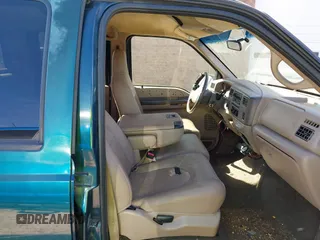 1999 Ford Super Duty F-250 XL with VIN 1FTNW21S2XEE10313, listed as a IAAI auction lot 41825300 with 150,619 mi miles. Bid and sale history available at carsss.com. Image 5.