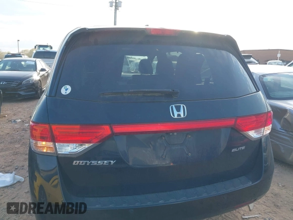 2014 Honda Odyssey Touring with VIN 5FNRL5H90EB077054, listed as a IAAI auction lot 41904456 with 197,869 mi miles and . Bid and sale history available at carsss.com. Image 16.