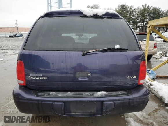 1999 Dodge Durango with VIN 1B4HS28Y3XF569044, listed as a Copart auction lot 44583815 with 70,682 mi miles and Salvage title. Bid and sale history available at DreamBid. Image 6.