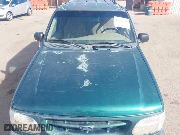 1999 Ford Explorer Sport with VIN 1FMYU22X2XUB19728, listed as a IAAI auction lot 41642358 with 128,788 mi miles and . Bid and sale history available at DreamBid. Image 6.