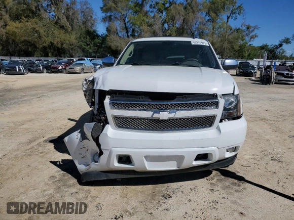 2014 Chevrolet Tahoe LT with VIN 1GNSCBE08ER192587, listed as a Copart auction lot 49216975 with 178,595 mi miles and Salvage title. Bid and sale history available at DreamBid. Image 5.