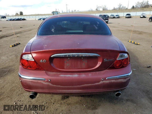 2000 Jaguar S-Type V8 with VIN SAJDA01D6YGL58384, listed as a Copart auction lot 46872315 with 105,274 mi miles and Salvage Title. Bid and sale history available at DreamBid. Image 6.