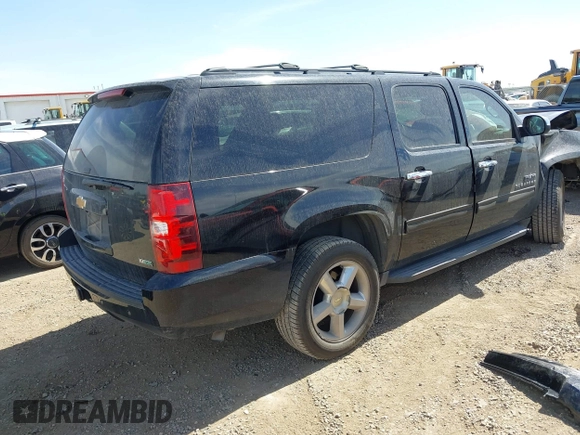 2012 Chevrolet Suburban LS with VIN 1GNSCHE03CR241355, listed as a IAAI auction lot 41791615 with 214,964 mi miles. Bid and sale history available at carsss.com. Image 4.