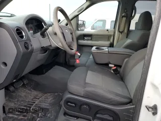2007 Ford F-150 XLT with VIN 1FTRW14W47KC40614, listed as a Copart auction lot 42415565 with 295,398 mi miles and Salvage title. Bid and sale history available at DreamBid. Image 7.