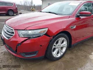 2014 Ford Taurus SEL with VIN 1FAHP2E87EG121203, listed as a IAAI auction lot 41908069 with 140,451 mi miles. Bid and sale history available at carsss.com. Image 6.