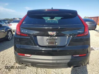 2022 Cadillac XT4 FWD Luxury with VIN 1GYAZAR45NF136810, listed as a Copart auction lot 74359664 with 10,552 mi miles and Salvage title. Bid and sale history available at DreamBid. Image 6.