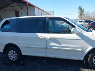 2004 Kia Sedona LX with VIN KNDUP131046577380, listed as a IAAI auction lot 41468710 with 138,451 mi miles and . Bid and sale history available at DreamBid. Image 13.
