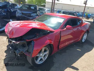 2018 Chevrolet Camaro 1LT z VIN 1G1FB1RS6J0139963, wystawiony jako IAAI lot #41885065 z przebiegiem 45 260 mil mil oraz . Historia ofert i sprzedaży dostępna na DreamBid. Obrazek 18.