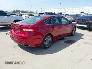 2014 Ford Fusion Titanium with VIN 3FA6P0K92ER293480, listed as a IAAI auction lot 41792642 with 156,828 mi miles. Bid and sale history available at carsss.com. Image 4.