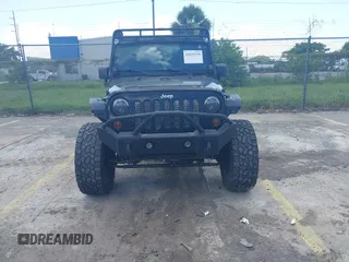 2012 Jeep Wrangler Unlimited Altitude with VIN 1C4HJWEG5CL161049, listed as a IAAI auction lot 42629330 with 217,147 mi miles and . Bid and sale history available at DreamBid. Image 6.