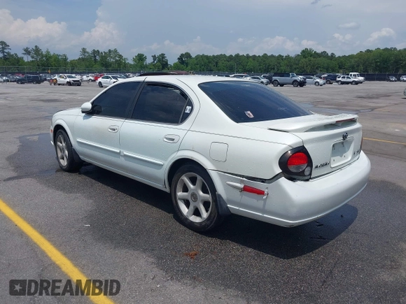 2000 Nissan Maxima GXE z VIN JN1CA31D6YT542083, wystawiony jako IAAI lot #42306685 z przebiegiem 296 613 mil mil oraz . Historia ofert i sprzedaży dostępna na DreamBid. Obrazek 3.