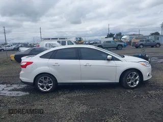 2014 Ford Focus Titanium with VIN 1FADP3J27EL142095, listed as a IAAI auction lot 42004419 with 139,515 mi miles. Bid and sale history available at carsss.com. Image 13.