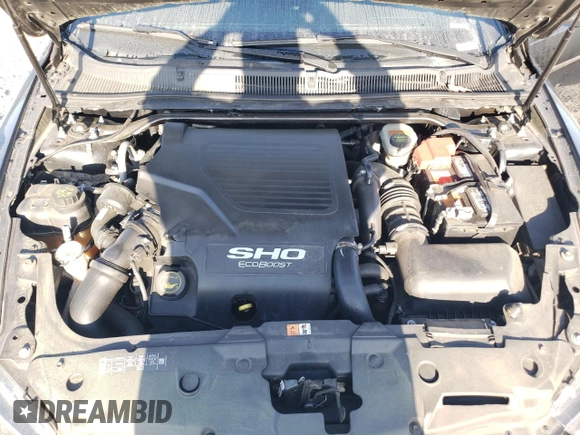 2014 Ford Taurus SHO with VIN 1FAHP2KT0EG181509, listed as a Copart auction lot 52615335 with 205,743 mi miles and Salvage title. Bid and sale history available at DreamBid. Image 11.