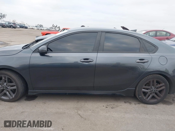 2021 Kia Forte GT-Line z VIN 3KPF34AD9ME316424, wystawiony jako IAAI lot #41467687 z przebiegiem 86 059 mil mil oraz . Historia ofert i sprzedaży dostępna na DreamBid. Obrazek 15.