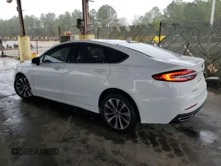 2020 Ford Fusion SE z VIN 3FA6P0T92LR173321, wystawiony jako Copart lot #86585494 z przebiegiem 102 285 mil mil oraz Szkoda całkowita • Salvage title. Historia ofert i sprzedaży dostępna na DreamBid. Obrazek 2.