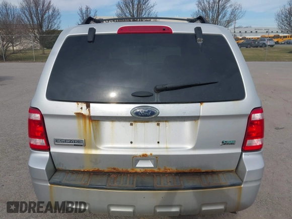 2011 Ford Escape Limited with VIN 1FMCU9EG3BKA75032, listed as a IAAI auction lot 41814428 with 177,984 mi miles and . Bid and sale history available at carsss.com. Image 16.
