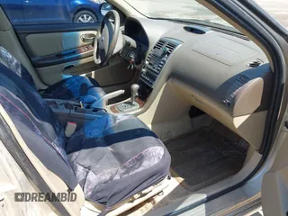 2002 Nissan Maxima GXE z VIN JN1DA31D92T207069, wystawiony jako IAAI lot #42439722 z przebiegiem 188 502 mil mil oraz . Historia ofert i sprzedaży dostępna na DreamBid. Obrazek 5.