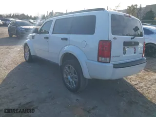 2011 Dodge Nitro Heat with VIN 1D4PT4GK0BW582589, listed as a IAAI auction lot 41015035 with 130,098 mi miles. Bid and sale history available at carsss.com. Image 3.